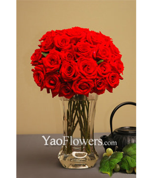 Two Dozen Red Roses With a Vase