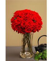 Two Dozen Red Roses With a Vase