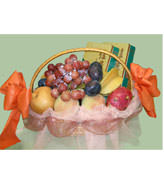 A basket of fruits for the Mid-Autumn Festival, includes red grape, golden pear,apple,two boxes of Mini mooncake an so on. 
