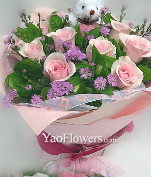 11 Pink roses and A bear