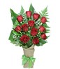 A dozen red roses arrive perfectly arranged