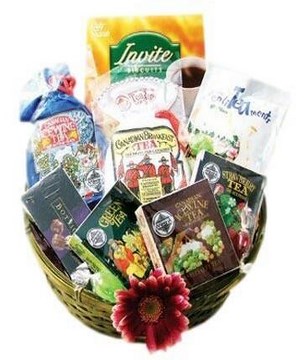 assortment of the gourmet tea and sweets in a basket
