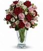 red and pink roses, white and light pink spray roses and greens