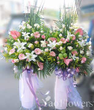 Perfume roses. Anthurium. sunflower. water bamboo. leaf material. 