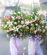 Perfume roses. Anthurium. sunflower. water bamboo. leaf material. 