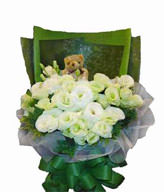 20 white lisianthus,1 bear