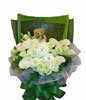 20 white lisianthus,1 bear