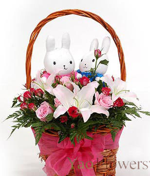 Basket included,16 red roses, 9 pink roses , 3 lilies , a pair of rabbits, green leafy fullness