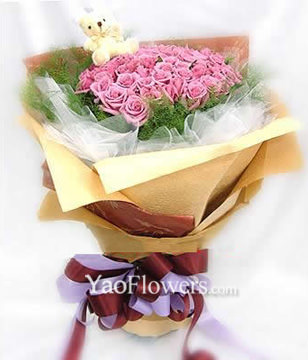 66 purple roses,a lovely bear