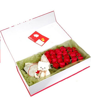 33 red roses, A plush bear
