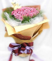66 purple roses,a lovely bear