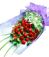 19 red roses with3 lilies around