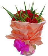 21 red roses with some gardenia and aspidistra