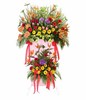 Big standing arrangement of gerberas, anthurium and greeneries