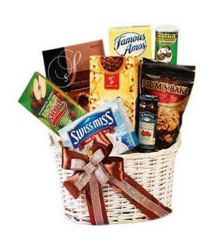 A basket of chocolates, cookies, choco chips & snack