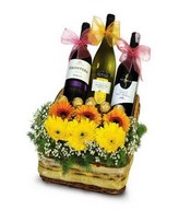2 Red & 1 White Wine with Ferrero Rocher and Gerberas arrangement