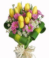 10 Yellow Tulip with Dracaena Foliage hand bouquet.