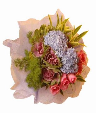 Purple cabbage, hydrangeas , pink roses with song of india in purple wrapping