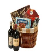 2 bottles of Red Wine, 3 boxes of assorted chocolates & a bottle of jam