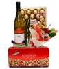White wine, a box of chocolate, Ferrero Rocher & bouquet of a red roses