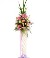This colourful decorating of Lilies, Daisies and  Roses