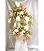 Flower arrangement of daisies, pompoms and orchids