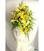 Floral arrangement of lilies and anthuriums