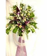 Flower arrangement of orchids and carnations